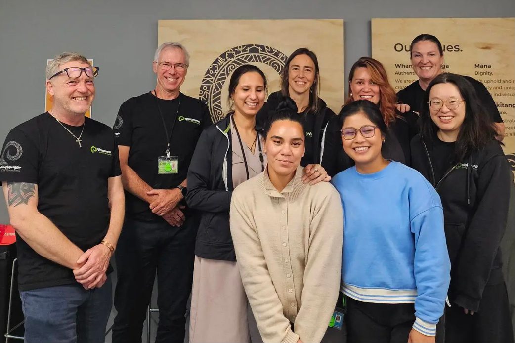 Home healthcare worker looking at phone