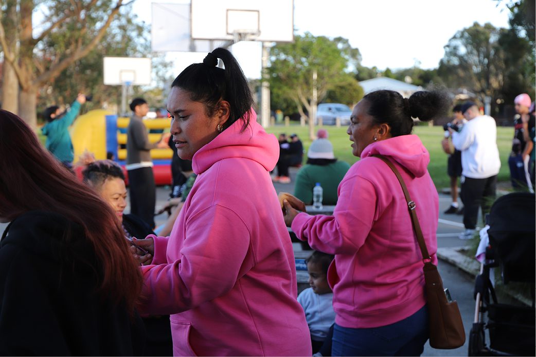 Group of people standing outside building