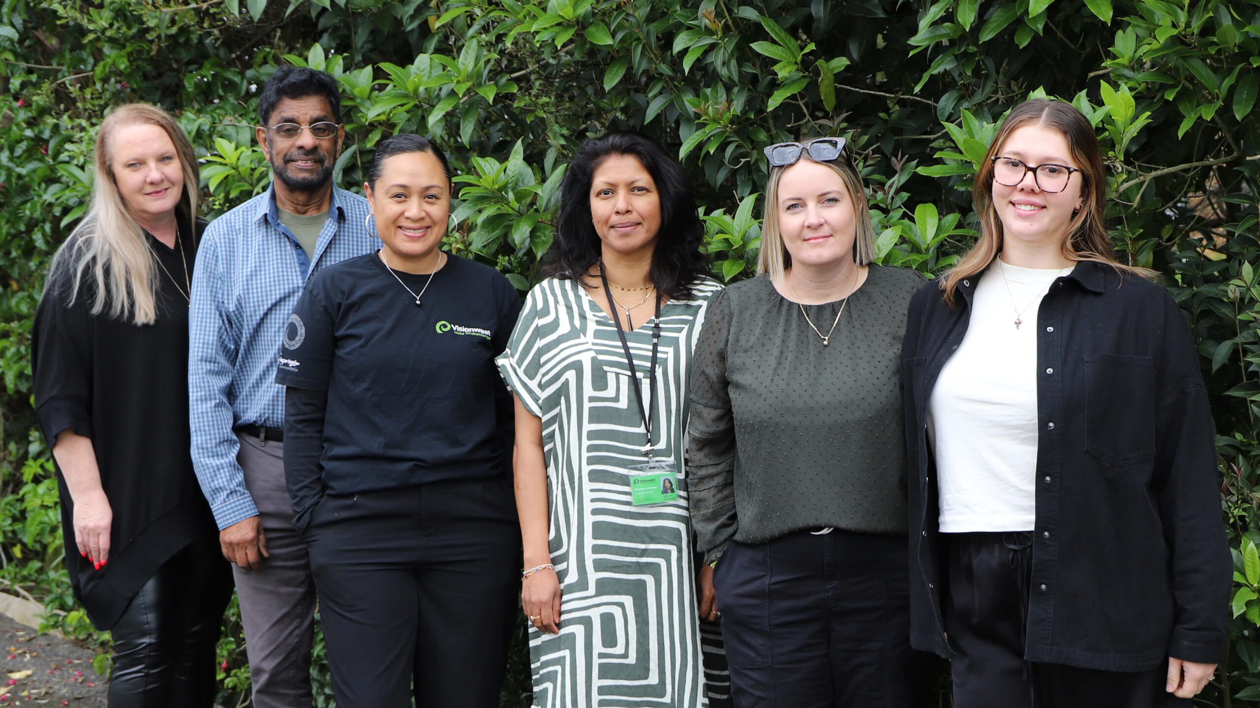 Group of people standing outside Marae