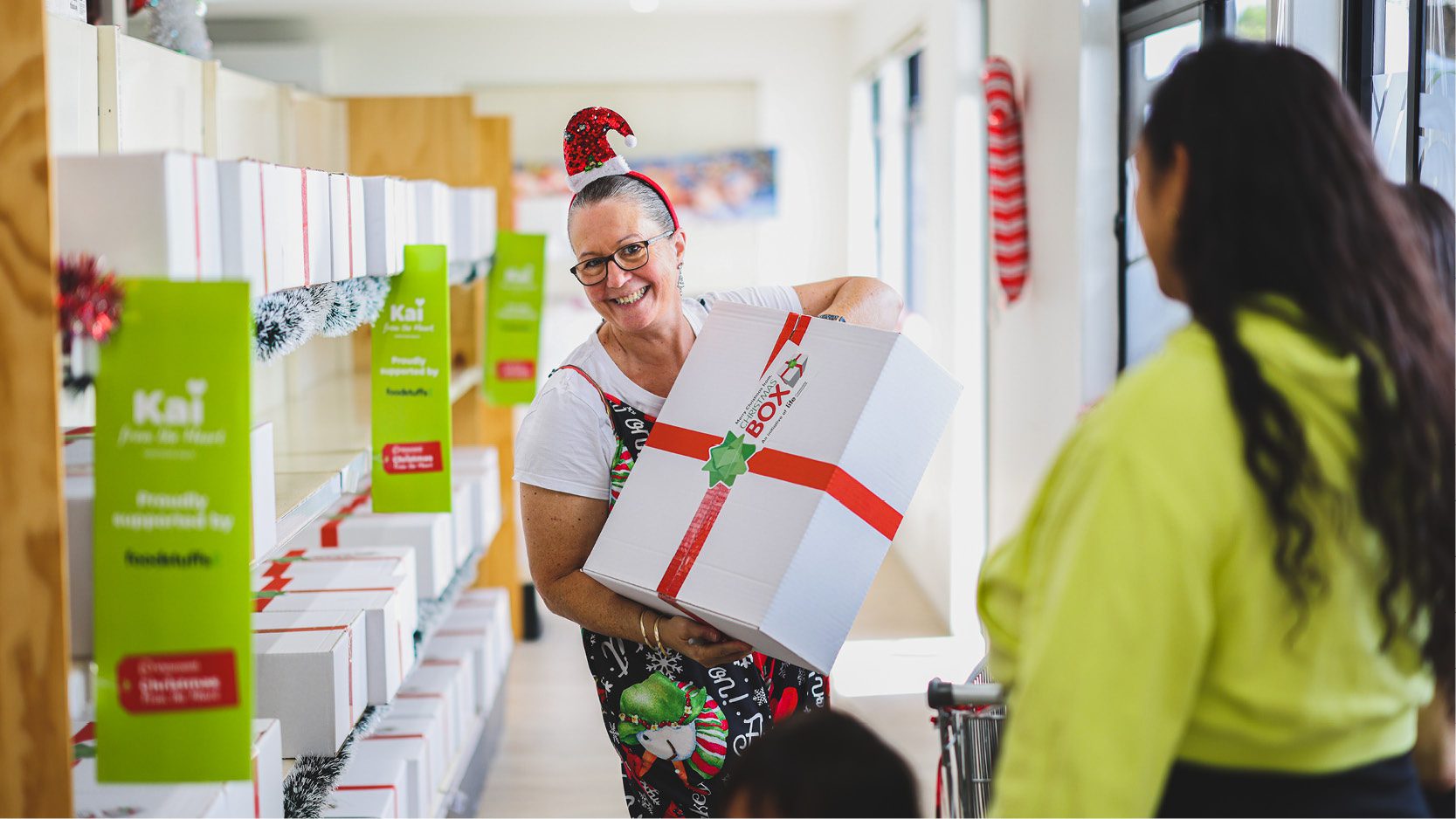 Staff stocking supermarket shelves